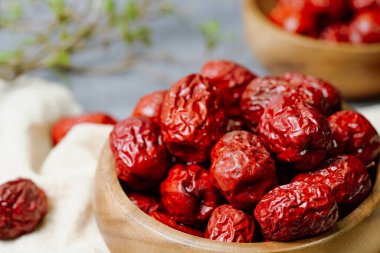 fresh korean jujube fruit in wood bowl