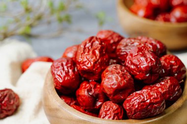 fresh korean jujube fruit in wood bowl