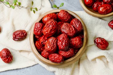 fresh korean jujube fruit in wood bowl