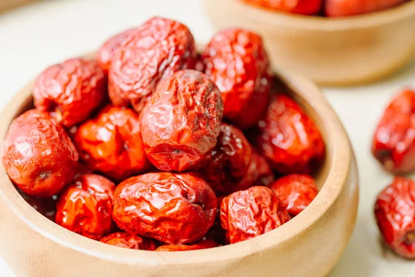 fresh korean jujube fruit in wood bowl