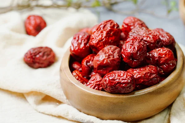 fresh korean jujube fruit in wood bowl