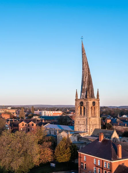 stock image CHESTERFIELD, UK - NOVEMBER 4, 2022.  An aerial view of the twisted Spire of The Parish of St Mary and All Saints church in Chesterfield, Derbyshire