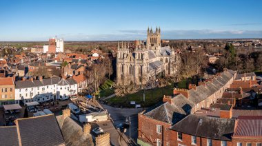SELBY, NORTH YORKSHIRE, UK - JANUARY 16, 2023.  An aerial view of the Yorkshire market town of Selby with the ancient architecture of Selby Abbey prominent