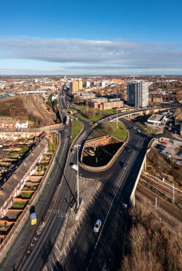 An aerial landscape view of the main road into Doncaster city centre with the East Coast Main Line railway providing access to the newly named English city