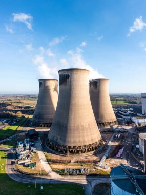 A vertical  aerial view of a group of cooling towers at a coal fired power station