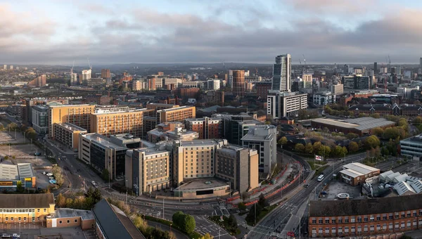 stock image An aerial panoramic view of a Leeds cityscape skyline with The Bridgewater Place skyscraper and Holbeck bathed in early morning sunlight at sunrise