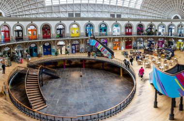CORN EXCHANGE, LEEDS, UK - AUGUST 14, 2023.  A high angle view of the interior of the historic Leeds Corn Exchange which is a now a marketplace for small independent retail business clipart