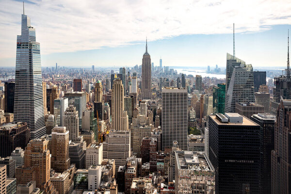 An aerial panoramic view of the Empire State building and surrounding district in Midtown Manhattan from the Top of the Rock