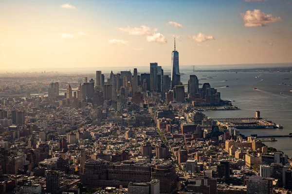 LOWER MANHATTAN, NEW YORK, USA - SEPTEMBER 16, 2023.  A landscape view of Lower Manhattan and the financial district overlooking the ocean from The Edge viewing platform in New York at sunrise
