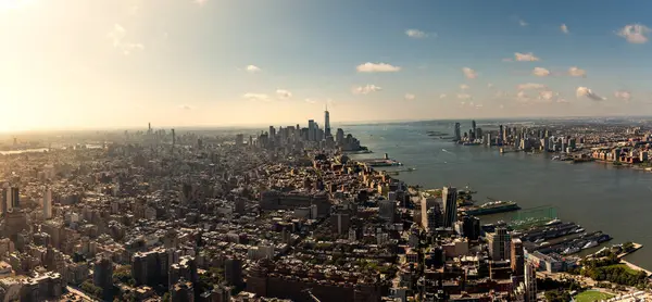 LOWER MANHATTAN, NEW YORK, USA - SEPTEMBER 16, 2023.  A panoramic landscape view of Lower Manhattan and the financial district from The Edge viewing platform in New York at sunrise