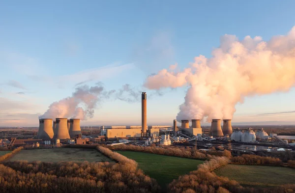 Drax coal fired power plant in North Yorkshire, UK with coal stack and Biomass storage tanks at sunset with copy space