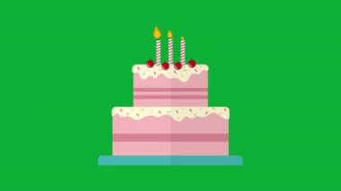 doğum günü pastası ile yeşil zemin üzerine mumlar.