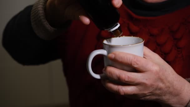 Elderly Woman Pour Cup Medicine Sedative Drops Cannabis Oil Close — Stok video