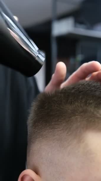 Young Barber Drying Hair Customer Hair Dryer Barber Shop Dark — Video Stock