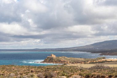 Port aux Princes, Tunisia, Cliffs and Rocks, Mediterranean Sea landscape with beautiful blue sky. Heavenly Escape. Takelsa