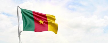 Cameroon flag waving on sky background. 3D Rendering