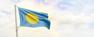 Gökyüzü arka planında dalgalanan Palau bayrağı. 3B Hazırlama