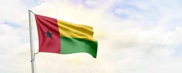 Guinea Bissau Flag Waving Sky Background Rendering — Zdjęcie stockowe