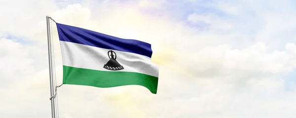 莱索托国旗在天空背景上飘扬 3D渲染 — 图库照片