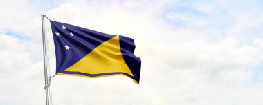 Tokelau bayrağı gökyüzü arka planında dalgalanıyor. 3B Hazırlama