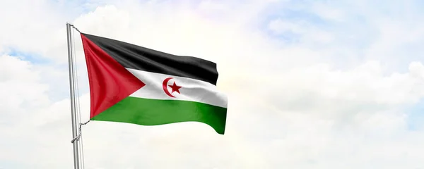 Western Sahara flag waving on sky background. 3D Rendering