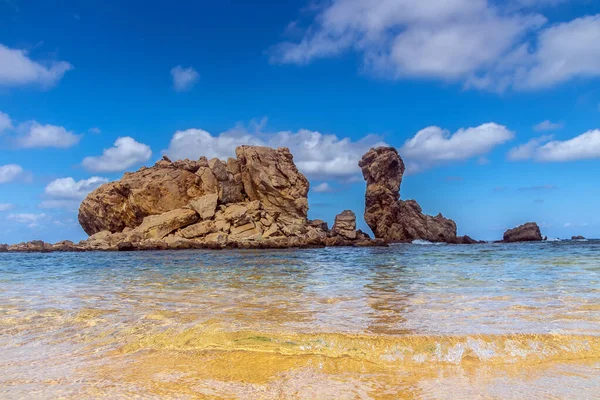 stock image Ong Jmal Beach. Rocky Shoreline with Clear Blue Skies in Bizerte, Tunisia