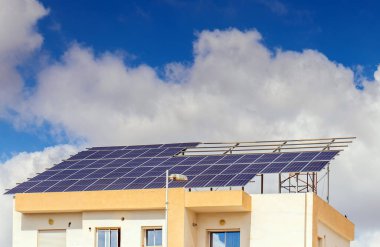 Solar Panels Installed on a Rooftop clipart