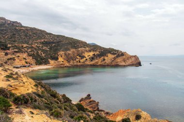 Ain Kanassira: Korbous 'un Dağlık Serenity ve Coastal Splendo' sunu Bağlayan Sahne Koyu. Kuzey Afrika