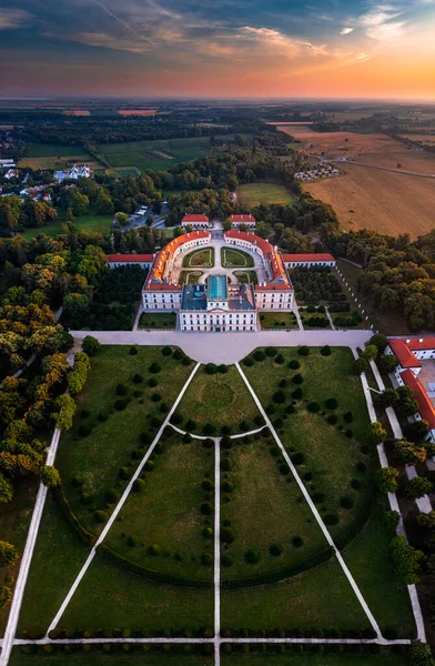 Fertod, Hungary - Aerial panoramic view of the beautiful Esterhazy Castle (Esterhazy-kastely) and garden in Fertod, near Sopron on a sunny summer morning with colourful golden and blue sky at sunrise