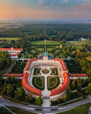 Fertod, Hungary - Aerial panoramic view of the beautiful Esterhazy Castle (Esterhazy-kastely) and garden in Fertod, near Sopron on a sunny summer morning with colourful sky and clouds at sunrise