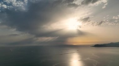 Cloudy sunset at sea