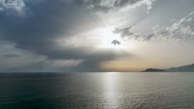 Cloudy sunset at sea