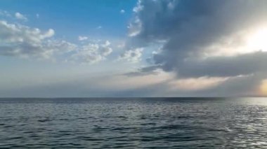 Cloudy sunset at sea