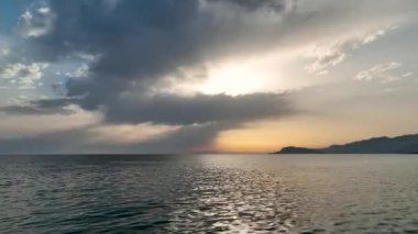Cloudy sunset at sea