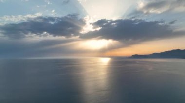 Cloudy sunset at sea