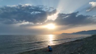 Cloudy sunset at sea