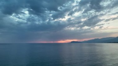 Cloudy sunset at sea