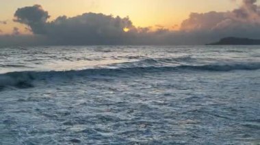 Cloudy sunset at sea