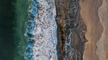 sea filmed on a drone in the sunset