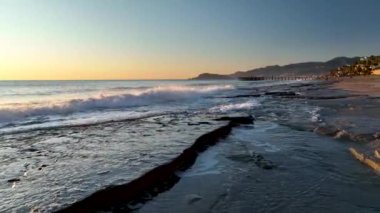 sea filmed on a drone in the sunset