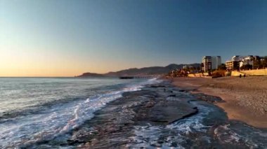 sea filmed on a drone in the sunset