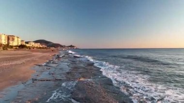 sea filmed on a drone in the sunset