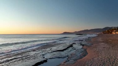sea filmed on a drone in the sunset
