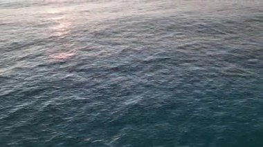sea filmed on a drone in the sunset