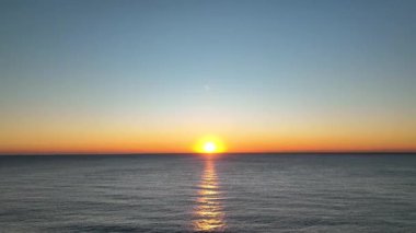 sea filmed on a drone in the sunset