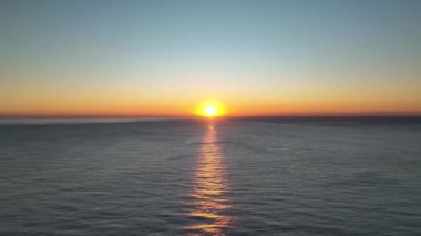 sea filmed on a drone in the sunset