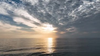 Cloudy sunset at sea