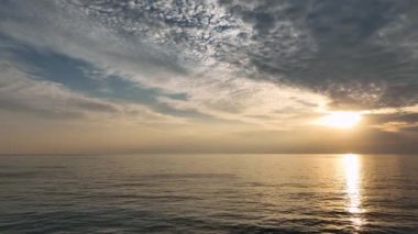 Cloudy sunset at sea