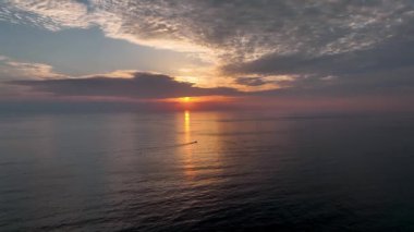 Cloudy sunset at sea