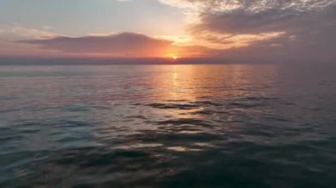 Cloudy sunset at sea